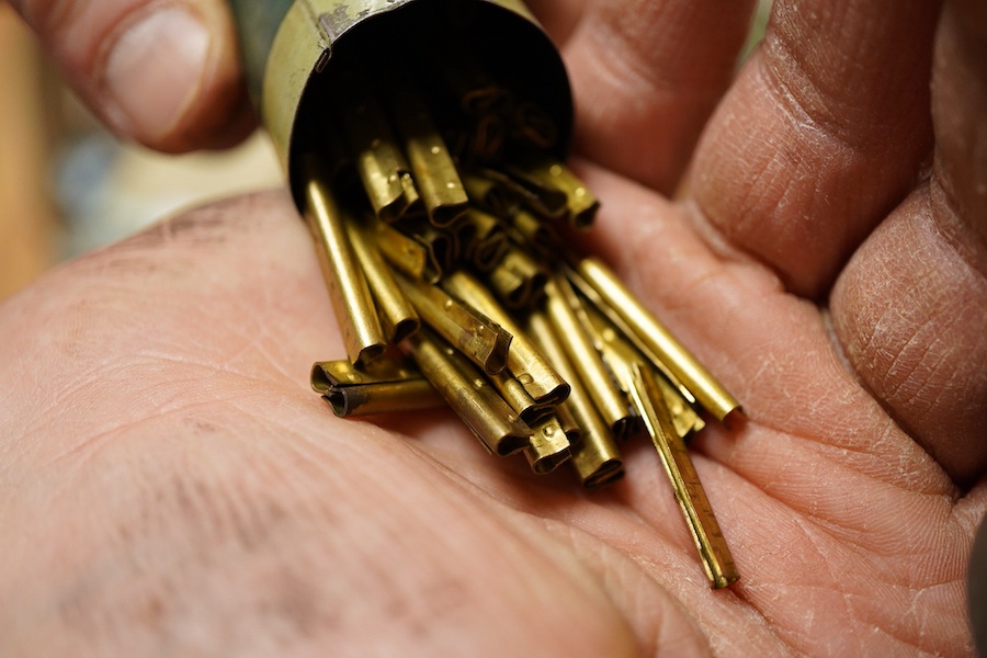 A quantity of Bassett-Lowke track sections, original rail joiners, together with three packets of additional brass flat bottom rail not mounted on sleepers, etc.